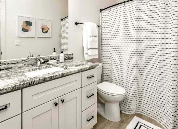 Modern bathroom model at Edge 204 in Omaha, NE