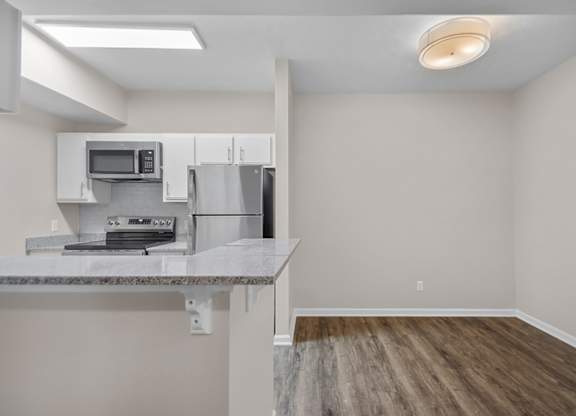 One and two bedroom apartment homes featuring efficient appliances, hardwood floors, walk-in closets, washer and dryer connections and much more at Parham Pointe Apartments in Little Rock, AR