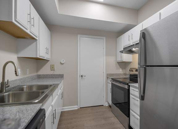 One and two bedroom apartment homes featuring efficient appliances, hardwood floors, walk-in closets, washer and dryer connections and much more at Parham Pointe Apartments in Little Rock, AR