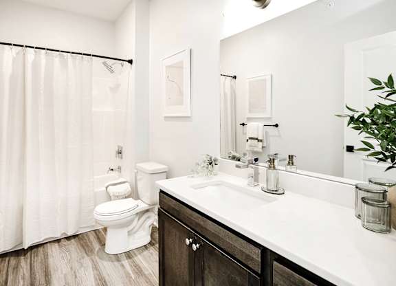 Modern one- and two-bedroom apartments featuring stainless steel appliances, high-end lighting, premium LVT flooring, granite countertops and more at The Ridgeline in Council Bluffs, IA