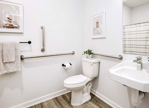 Modern one- and two-bedroom apartments featuring stainless steel appliances, high-end lighting, premium LVT flooring, granite countertops and more at The Ridgeline in Council Bluffs, IA