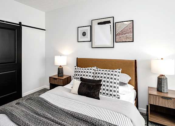 Modern one- and two-bedroom apartments featuring stainless steel appliances, high-end lighting, premium LVT flooring, granite countertops and more at The Ridgeline in Council Bluffs, IA