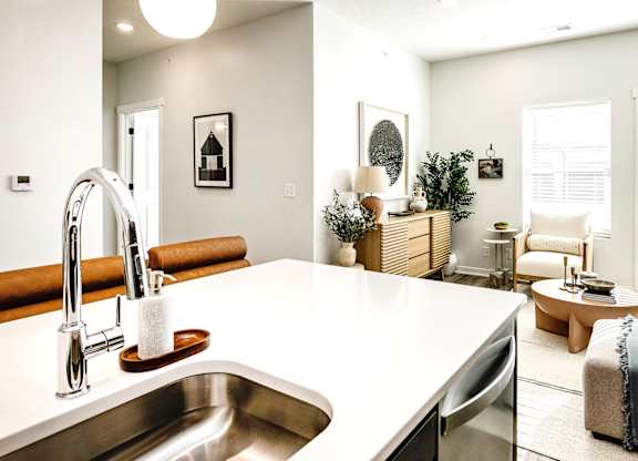Modern one- and two-bedroom apartments featuring stainless steel appliances, high-end lighting, premium LVT flooring, granite countertops and more at The Ridgeline in Council Bluffs, IA