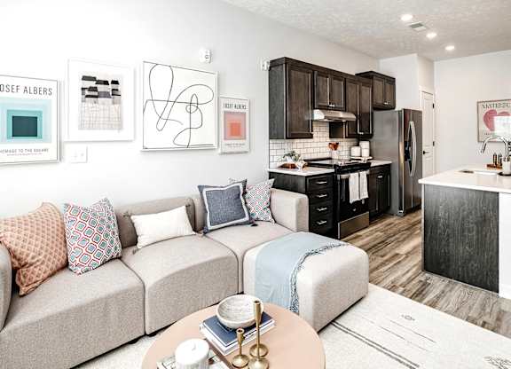 Modern one- and two-bedroom apartments featuring stainless steel appliances, high-end lighting, premium LVT flooring, granite countertops and more at The Ridgeline in Council Bluffs, IA