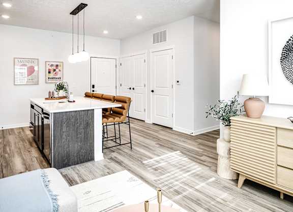 Modern one- and two-bedroom apartments featuring stainless steel appliances, high-end lighting, premium LVT flooring, granite countertops and more at The Ridgeline in Council Bluffs, IA