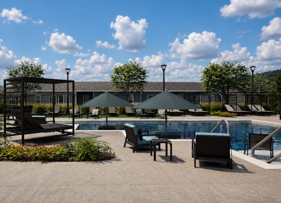 A pool area with a large building in the background.