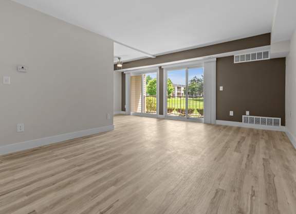 Unfurnished Living Area at Sunnymede Apartments - Troy, MI, Michigan