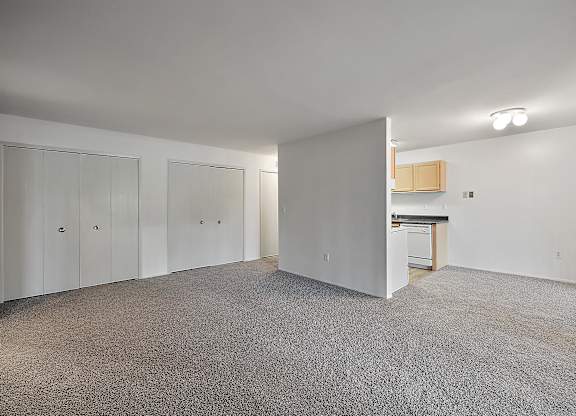 Carpeted Living Area at Sunnymede Apartments - Troy, MI, Troy, Michigan