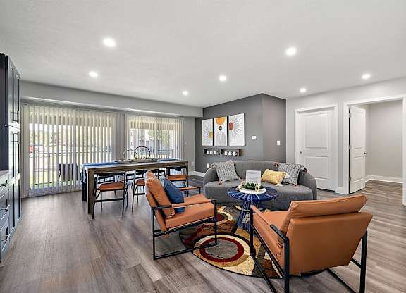 the residence on lamar apartment homes leasing office and living room at Sunnymede Apartments - Troy, MI, Troy