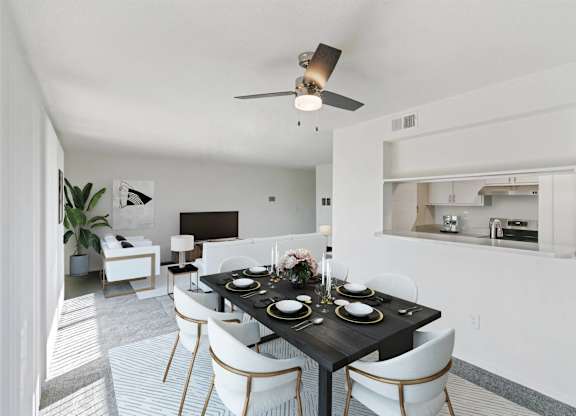 A modern dining room with a black table set for two at The Waverly on the Lake - Belleville, MI Apartment , Belleville, Michigan