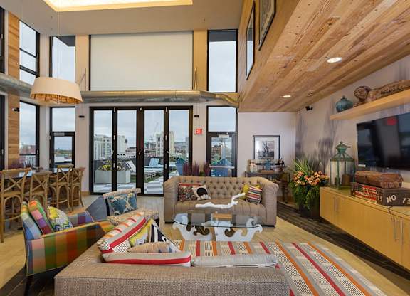 A living room with a couch and a chair.