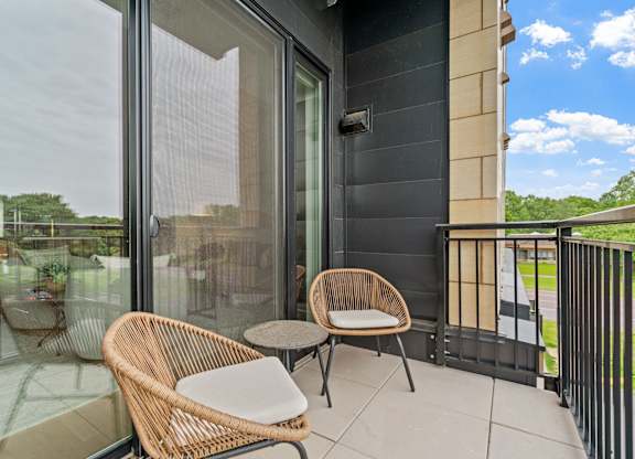 Outdoor private balcony in a one-bedroom, one-bathroom apartment home at Lilia in Lilydale, MN 55118