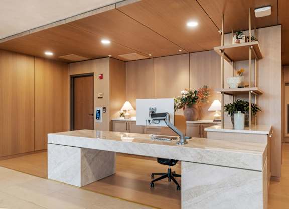 The lobby, leasing offices, and mailroom at Lilia in Lilydale, MN 55118