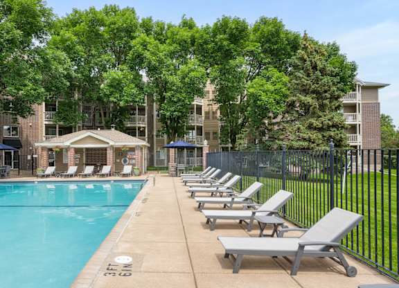 our apartments have a resort style pool with lounge chairs at Cityscape, St Louis Park, MN, 55416