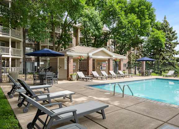 our apartments have a swimming pool and lounge chairs at Cityscape, St Louis Park, 55416