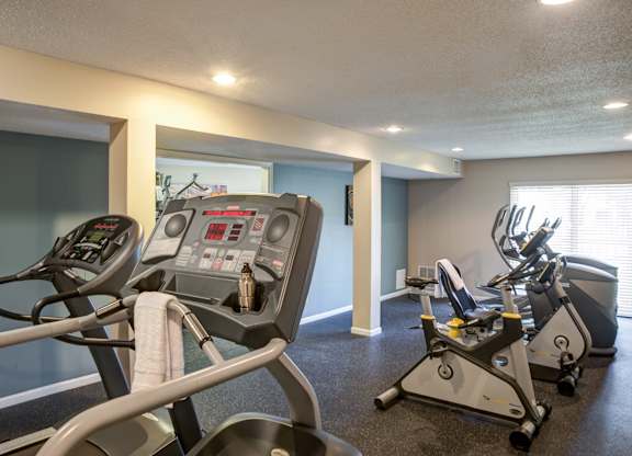 the gym has plenty of equipment for everyone to use at Cityscape, St Louis Park, 55416