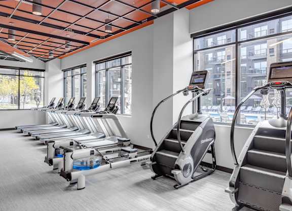 a gym with cardio equipment and exercise machines at Expo, Minnesota, 55414