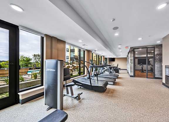 A gym with treadmills, weights, and exercise equipment. at Lilia, Minnesota