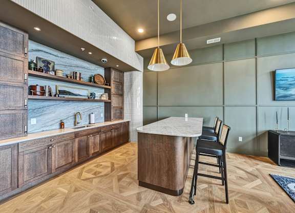 A kitchen with a wooden table and chairs.at Lilia, Lilydale, Minnesota