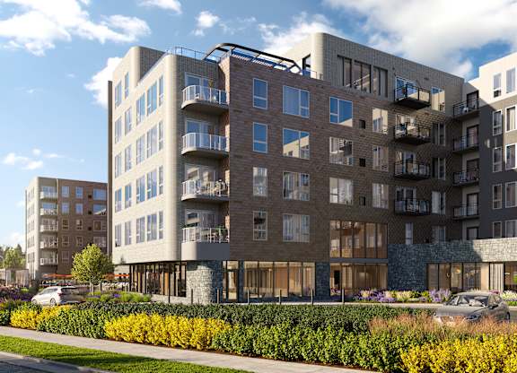 a rendering of an apartment building on a city street at The Mera, St Louis Park, MN