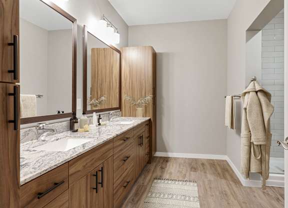 Upstairs Bathroom with Large Vanity and Built-In Storage at Nuvelo at Parkside, Apple Valley