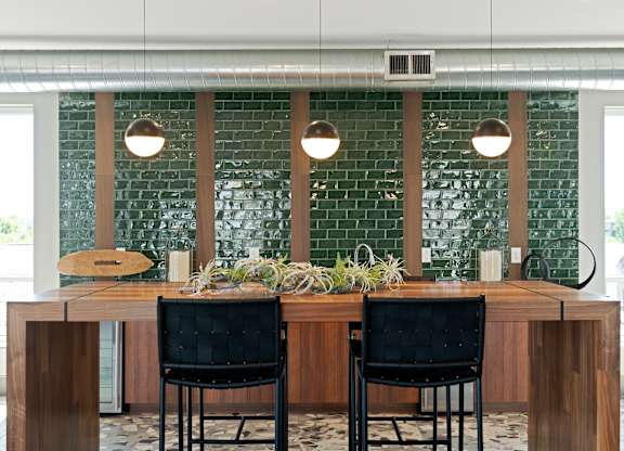 Table and lounge at The Mera, St Louis Park, 55426