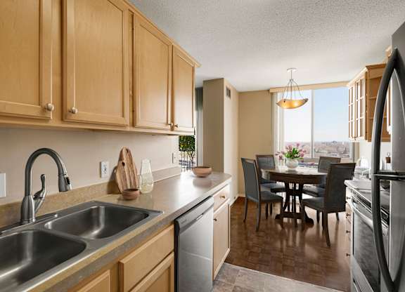 a kitchen and dining area  at The Edina Towers, Edina, Minnesota
