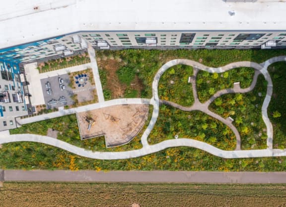 a birds eye view of a garden in a building at Zelia on Seven, St Louis Park, 55416