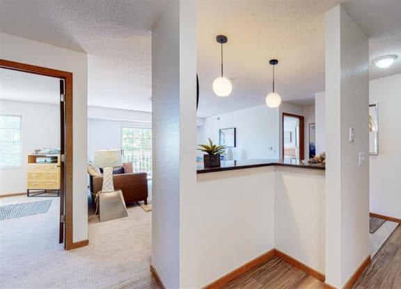 a kitchen view with pendant lighting