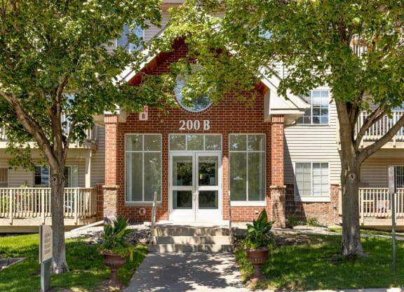 the front of the 2100 b apartments building