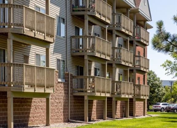 the balconies of an apartment building on a sunny day