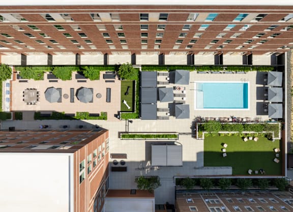 Aerial view of rooftop amenity deck with pool at Garden Court Towers Apartments, Philadelphia, 19143