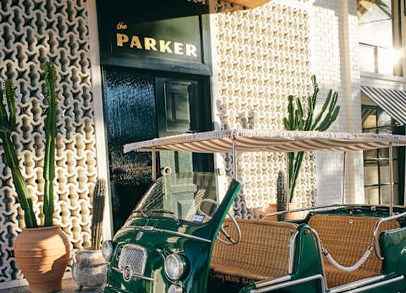 A green and white vintage car at The PARKER on E Mulberry Apartments, San Antonio, TX, 78209
