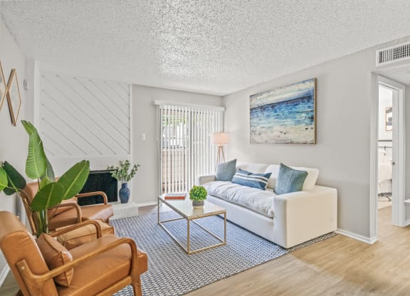 a living room with a couch and a table at District 2308, Texas ?