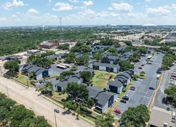 an aerial view of a neighborhood of houses in a city at District 2308, Arlington, TX 76011 ?