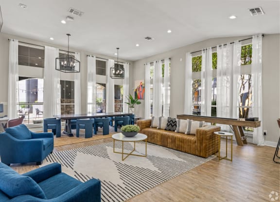 a living room with couches and chairs and a table at District 2308, Texas ?
