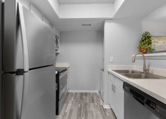 a kitchen with stainless steel appliances and a sink at District 2308, Arlington ?