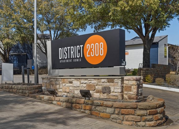 the sign for district 2400 in front of a building at District 2308, Arlington, TX ?