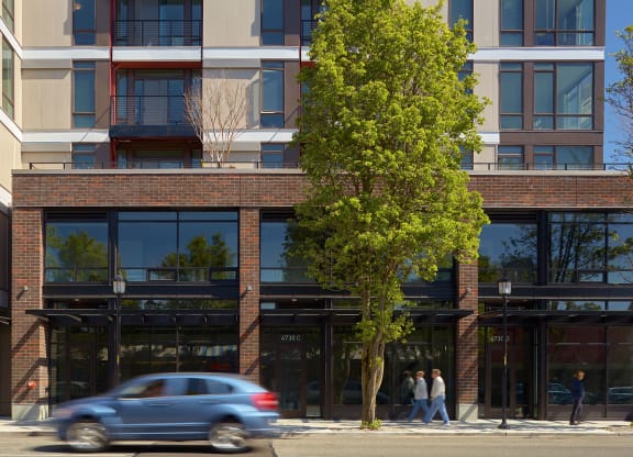 4730 California Apartments Building Exterior and Street