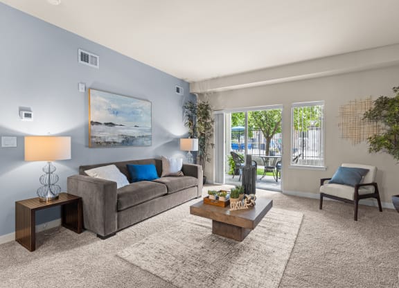 an open living room with a couch and a coffee table