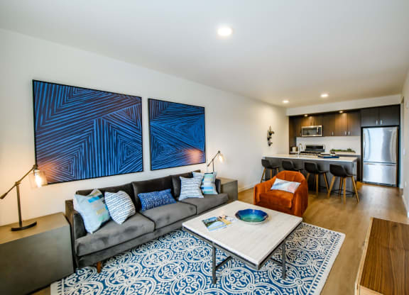 Wood style plank flooring, stainless steel appliances, and gas cooktops, oh my!