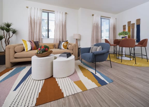 a living room with a couch and a table