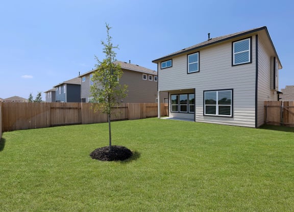 Rivers Edge Apartments Private, Fenced Backyards with Grass