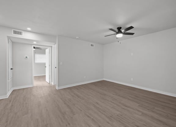 Unit image of renovated bedroom with vinyl flooring at Sunset Heights, San Antonio, TX
