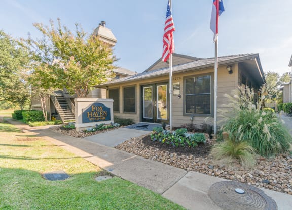 a house with an american flag in front of it