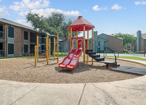 playground at legacy apartments in plano, tx