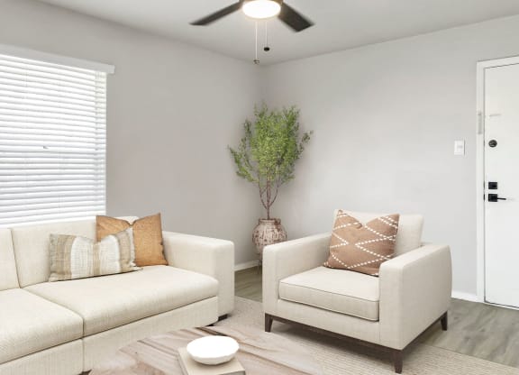 a living room with two couches and a coffee table  at Sunset Heights, San Antonio, Texas