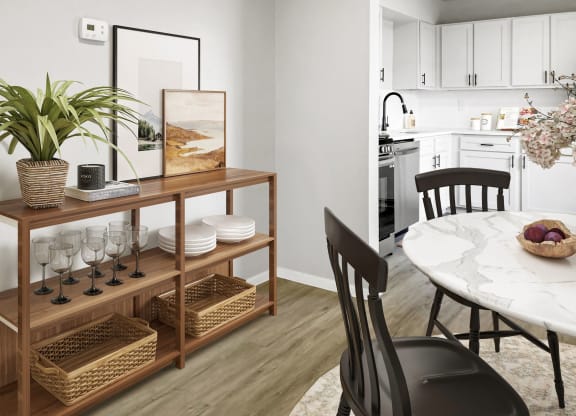 a dining room with a table and chairs and a kitchen in the background  at Sunset Heights, San Antonio