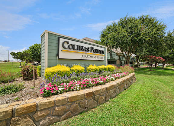 A sign for Colin's Runes Apartment Home is shown.