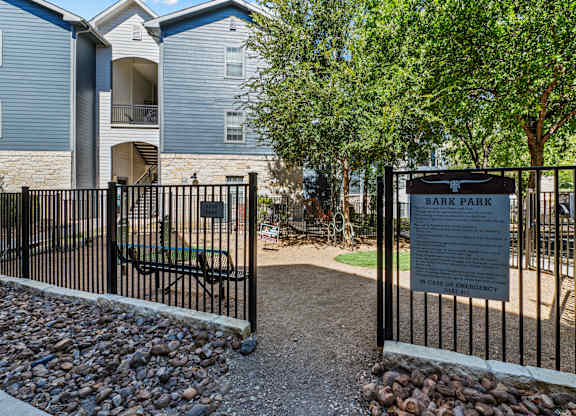 the preserve at ballantyne commons park entrance with gate and bench at Remington Ranch, San Antonio